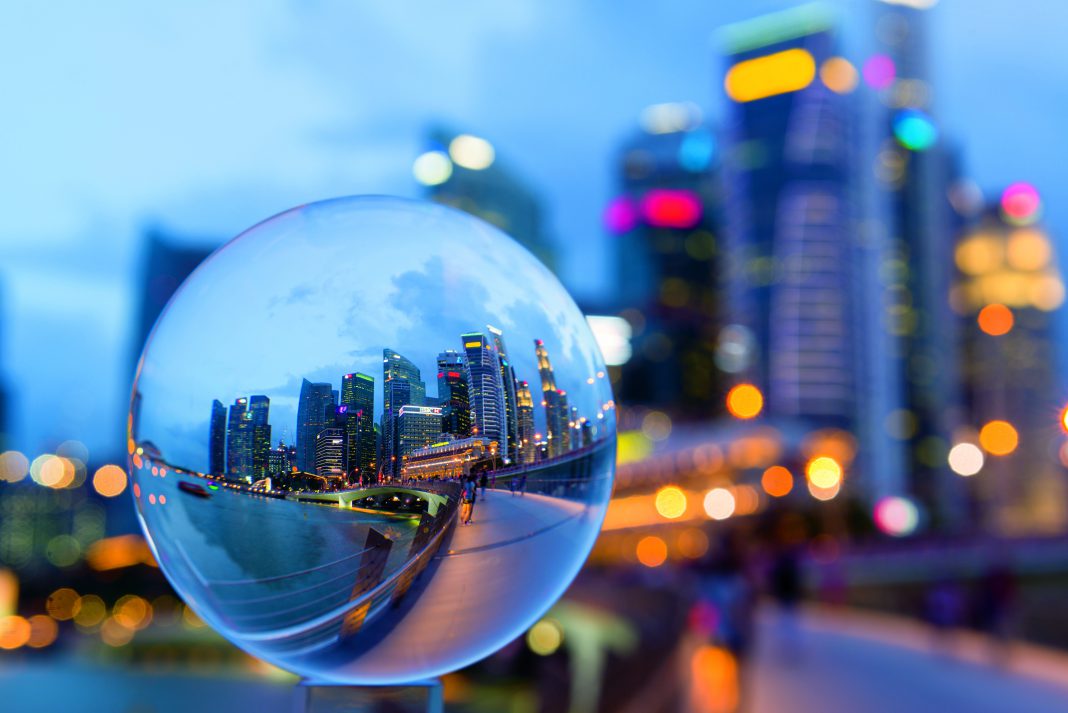 Crystal-Ball-with-Reflection-of-Singapore-CBD-Skyline-482453586_7360x4912