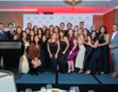 group of students on stage at annual scholarship awards gala