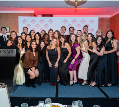 group of students on stage at annual scholarship awards gala